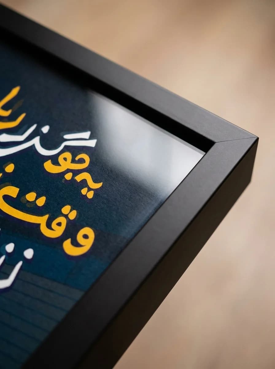 Close-up of the matte black floating frame corner and canvas edge