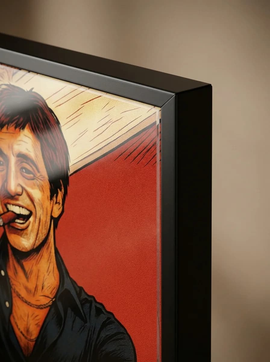 Close-up macro detail of Tony Montana Scarface canvas and black frame edge